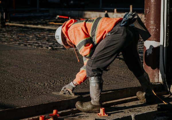 The workers in the construction site